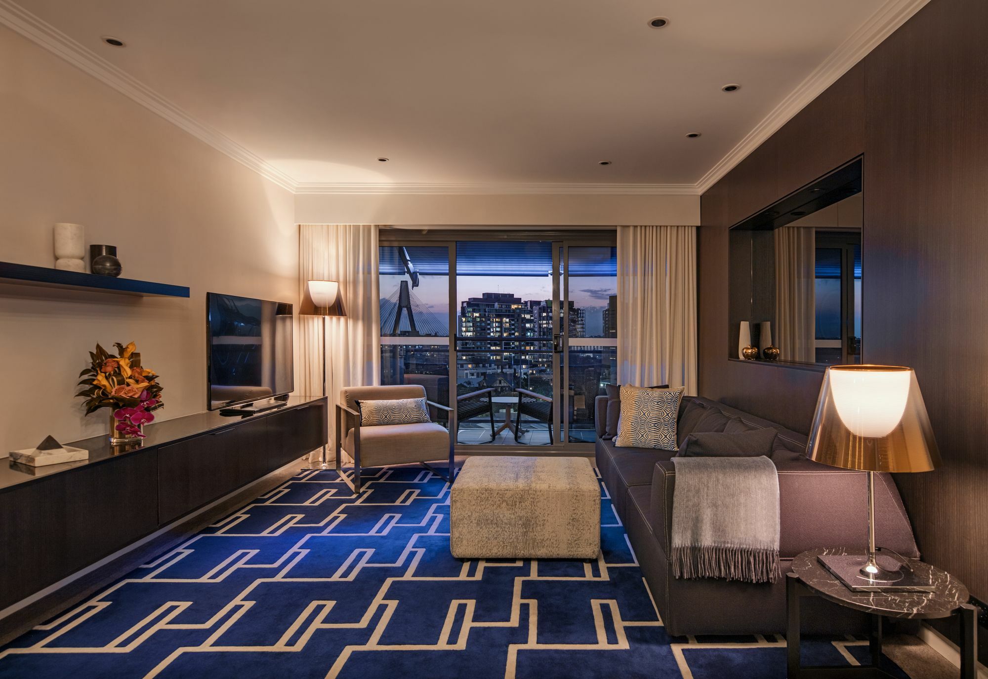 The Star Grand Hotel And Residences Sydney Kültér fotó A living room at the Ritz-Carlton, Singapore